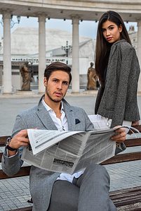 man reading newspaper - Morning Brew - A Newsletter Made for Millennials [2022 Review]