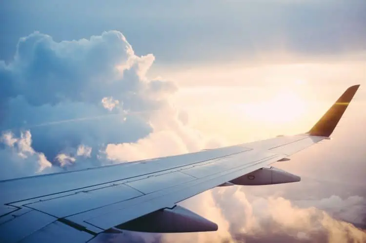 airplane wing - Travel Rewards 101: Learn How to Travel for (Almost) Free