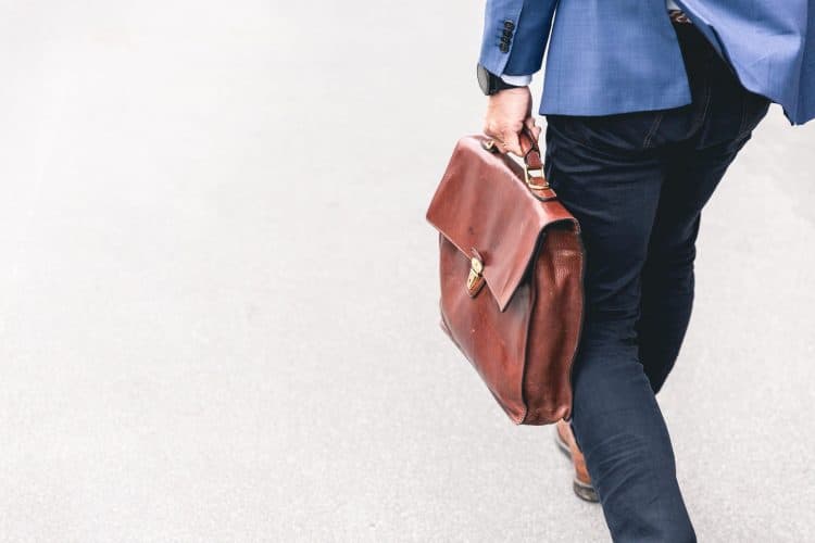 career advice for millennials man holding bag