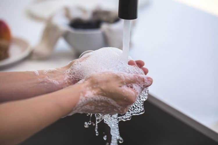 person washing hands scaled e1585342333224 - Stimulus Check 2020: Everything You Need to Know