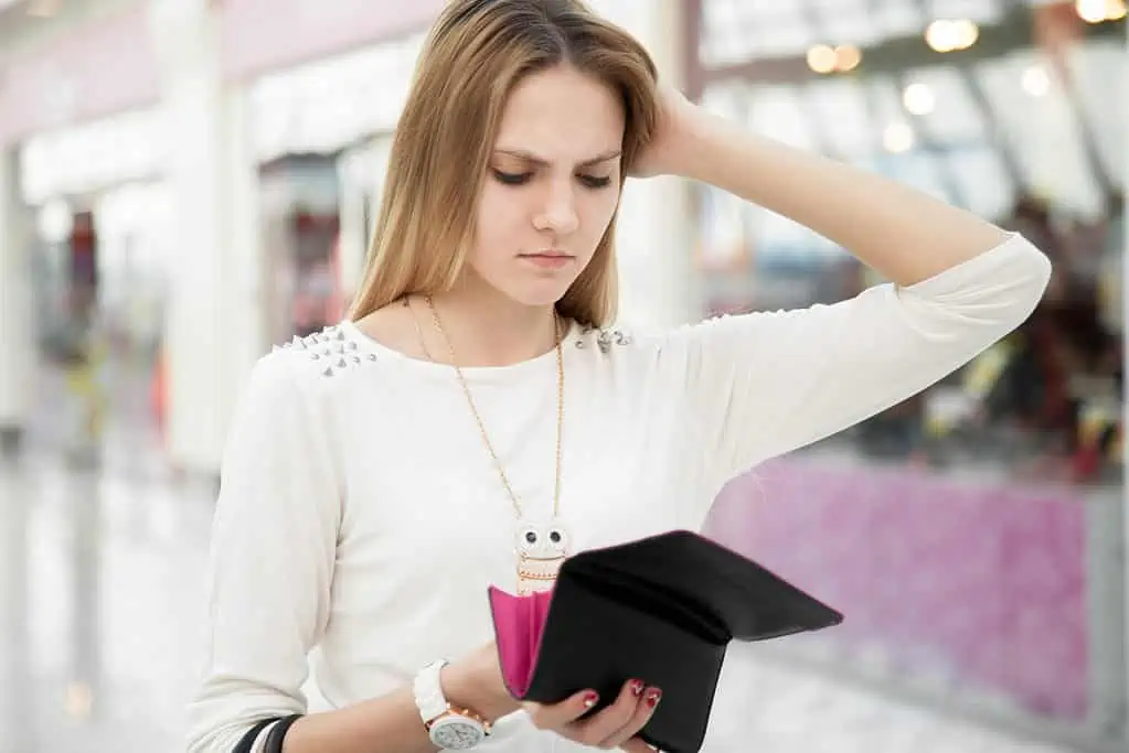 woman with empty wallet