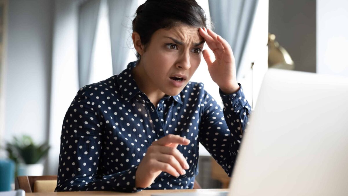 woman at computer worried