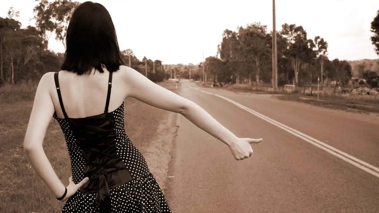 woman hitchhiking ss - 13 Things That Were Normal in 1970s - That Society Would Never Accept Today