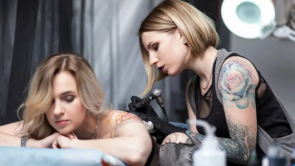 tattoo artist ss - 12 Highly Successful Careers (That Don't Require Going to College)