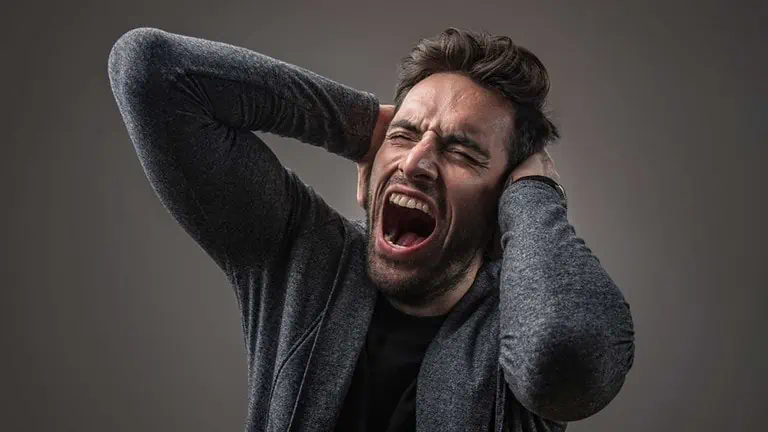 Stressed and angry man shouting