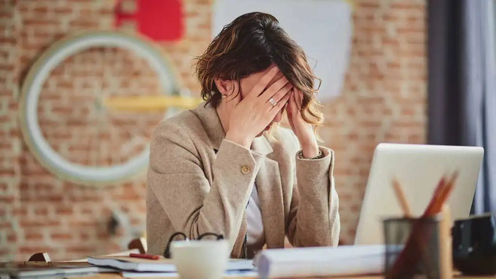 Woman stressed in office