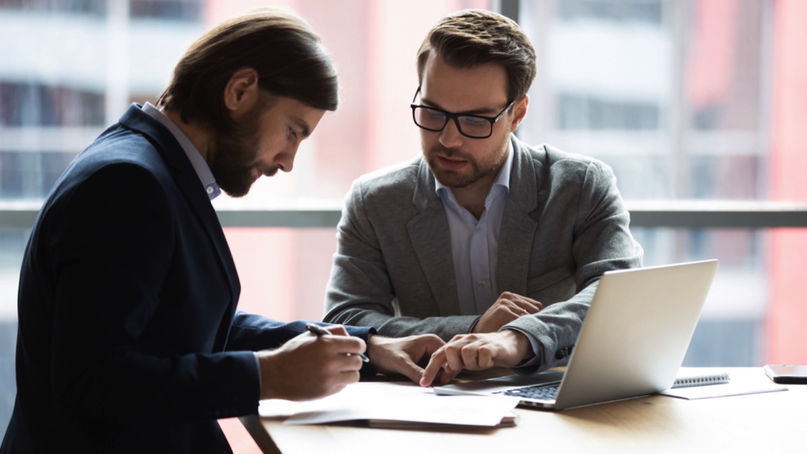 18 Mistakes New Employees Make Their First Week on the Job - Don't Be One of Them 5 Man signing document in office