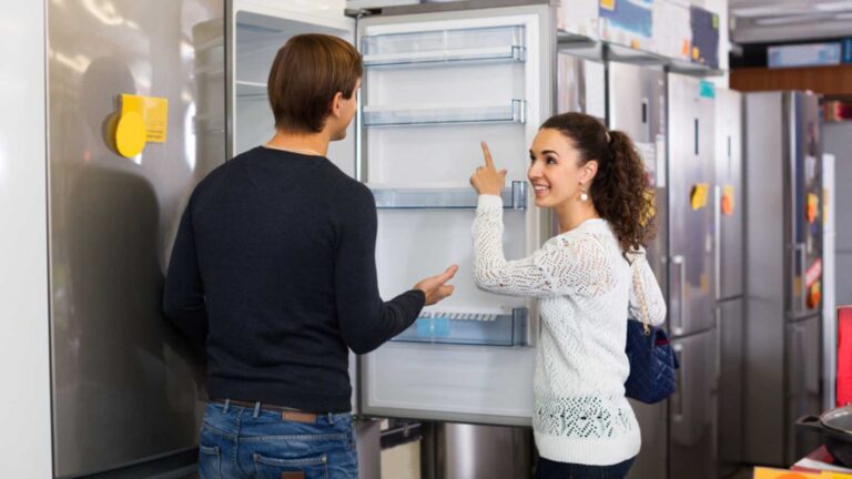 Woman buying refrigerator