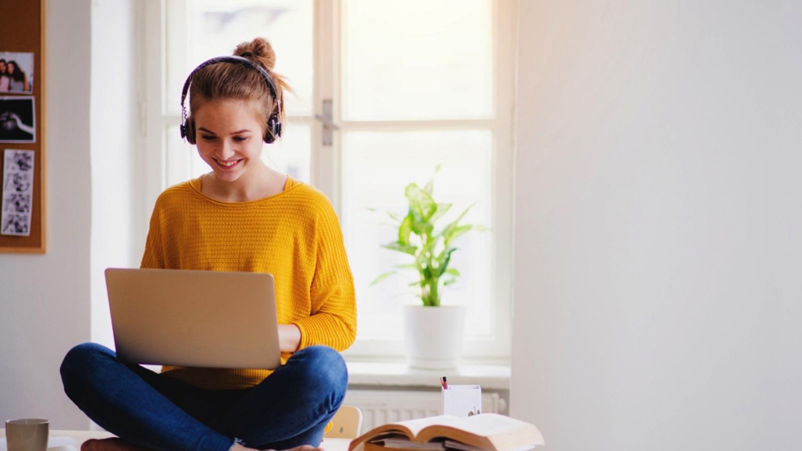20% of Retirees Going Back to Work - Here Are 17 Flexible Work-From-Home Retirement Jobs 16 Happy woman with headphone working