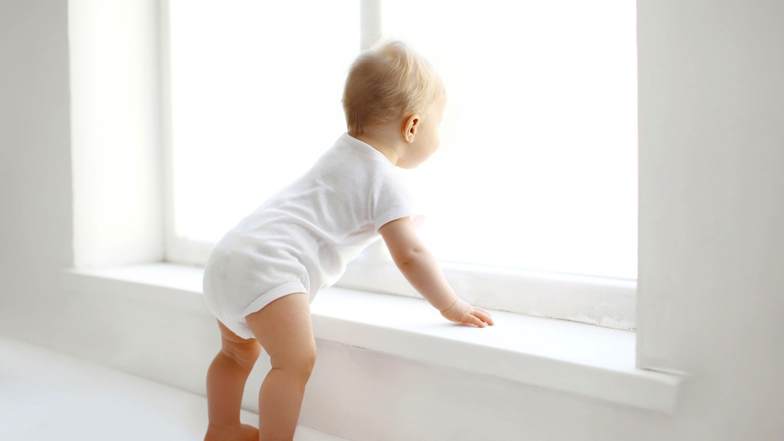 Baby near window