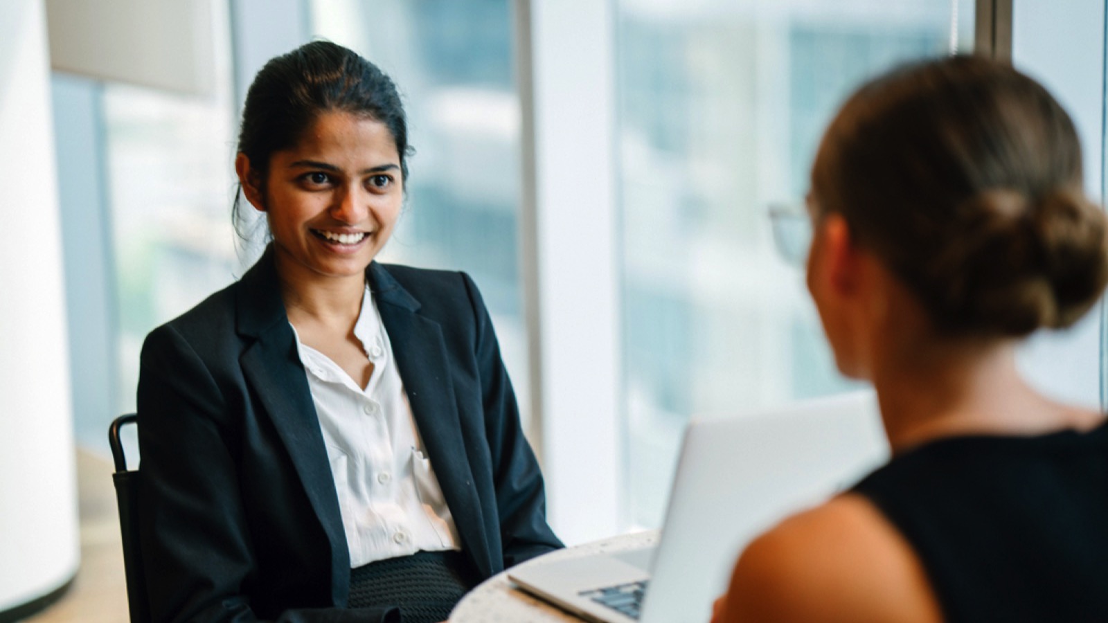 Indian Asian woman in interview