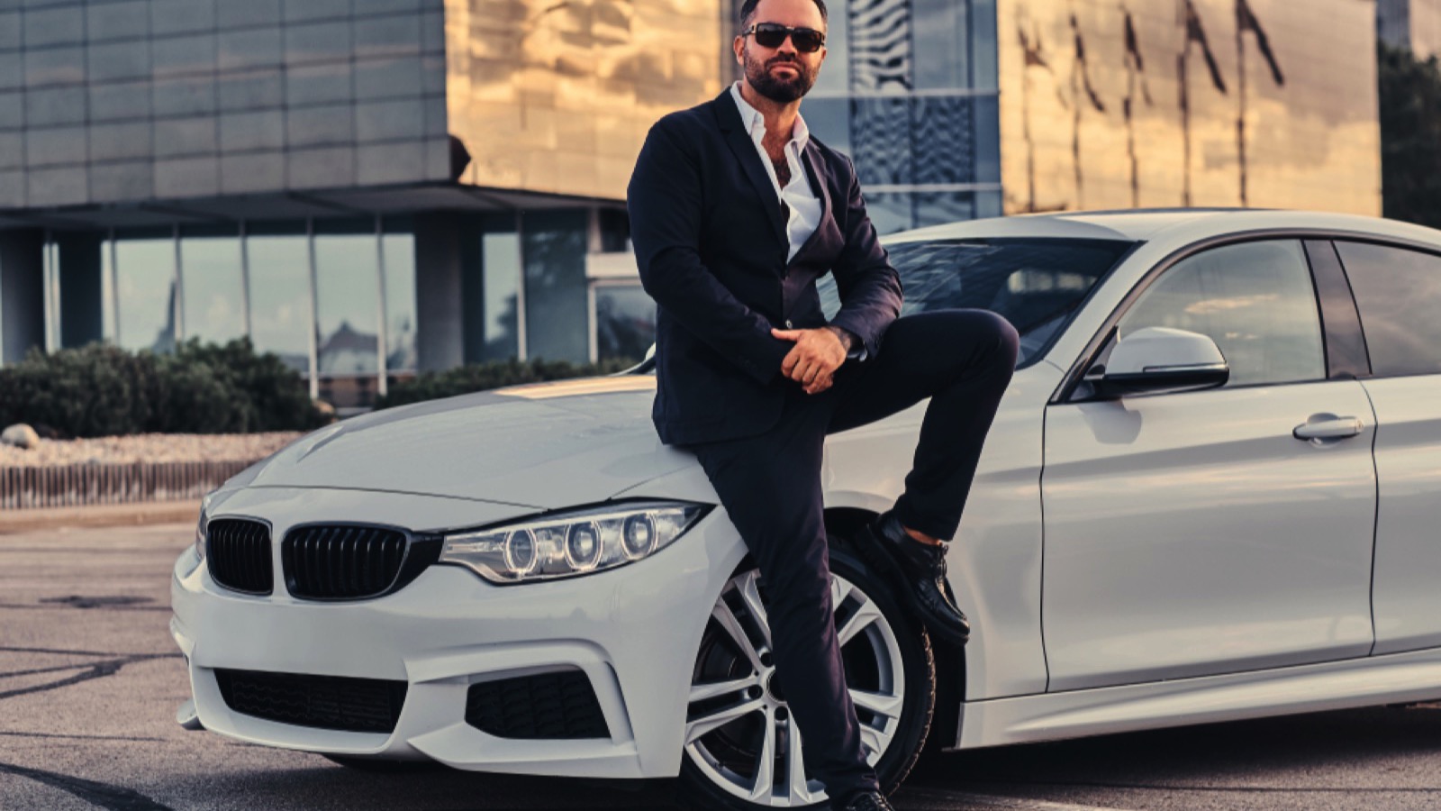 Man in luxury car