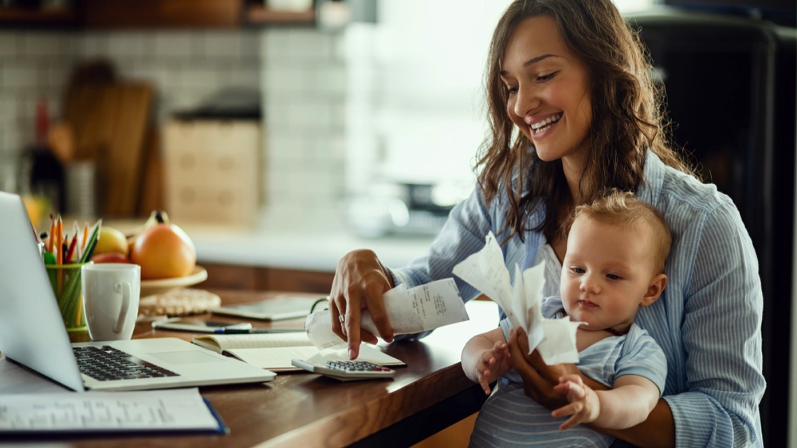 Mother with baby working