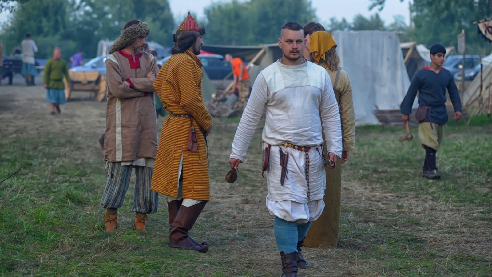 People in authentic historical clothing at a medieval feast
