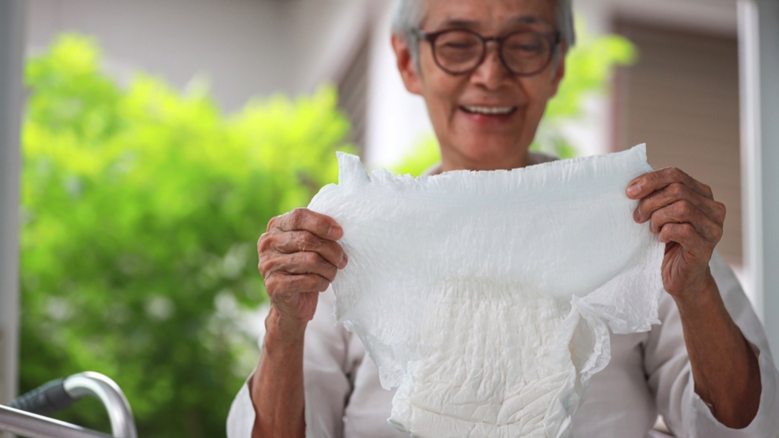 Senior woman with adult diaper
